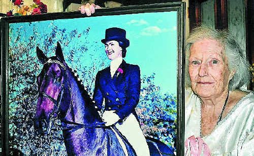Gloria Parker with a photo of Katie, who has been appointed the first female director of the Brisbane Broncos. Gloria Parker with a photo of Katie, who has been appointed the first female director of the Brisbane Broncos.